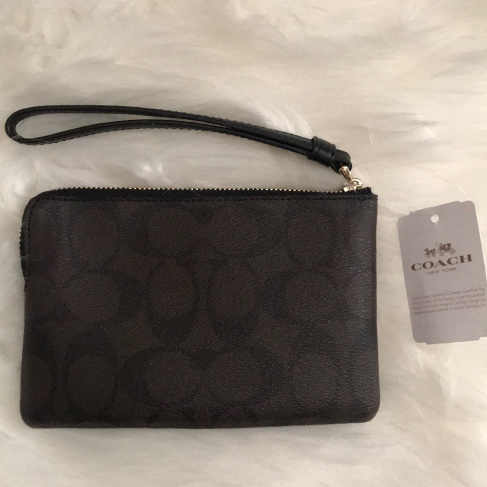 SOLD ON NEXTDOOR Coach wristlet - Picture 4 of 4